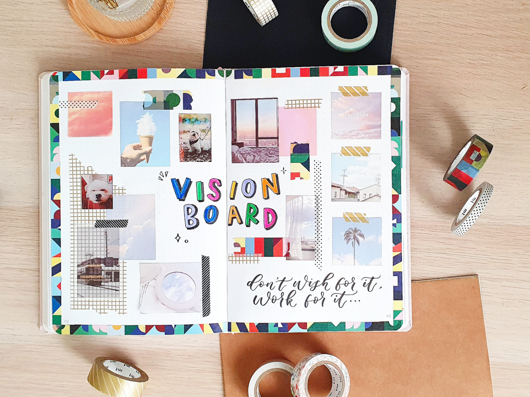 Journal page 'vision board' showing inspiring photos stuck in with washi masking tape.